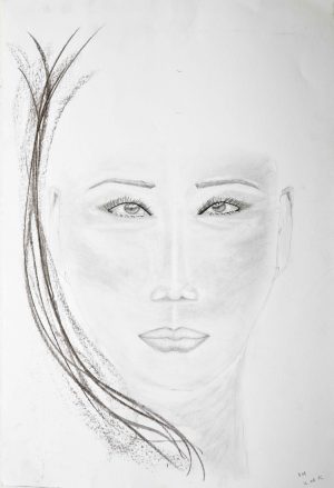 Pencil and charcoal sketch of a front-facing female portrait on white paper. The face features almond-shaped eyes with prominent eyelashes, defined eyebrows, and full lips with a neutral expression. Soft shading contours the cheeks and nose, while dark, stylized charcoal lines sweep up the left side to represent dynamic strands of hair.